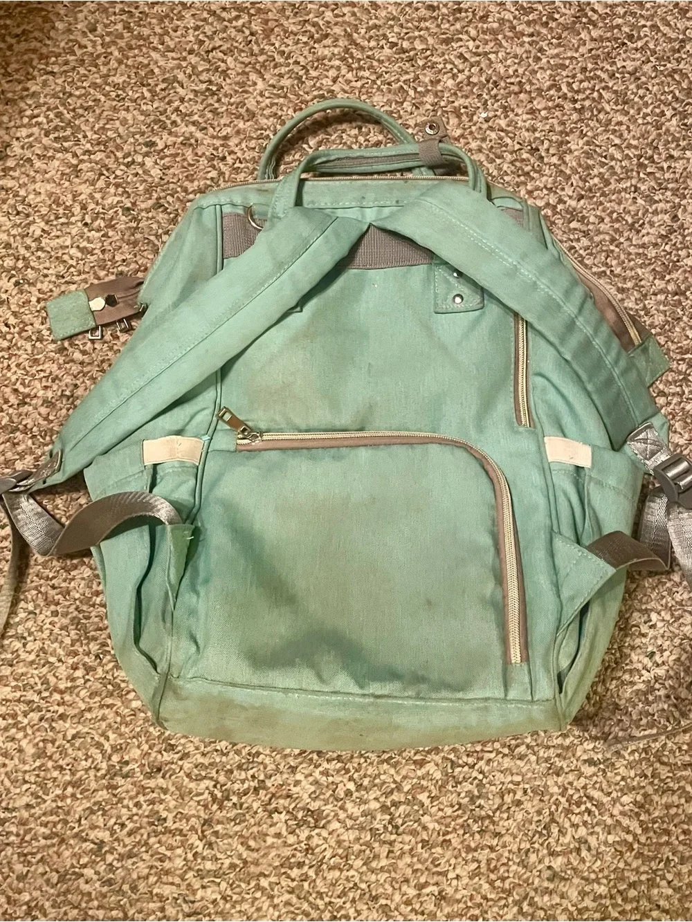Mint Green Canvas Backpack with Top Handle and Front Pocket